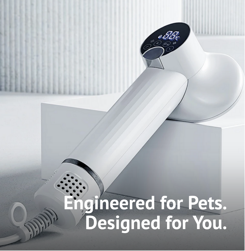 White pet hair dryer with digital display on a light gray background, featuring text 'Engineered for Pets. Designed for You.'